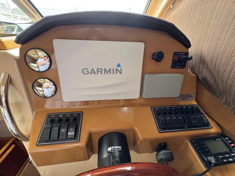 Slide: The Image of Dashboard of a 2016 Cutwater C-24 boat featuring Garmin navigation system. - 22