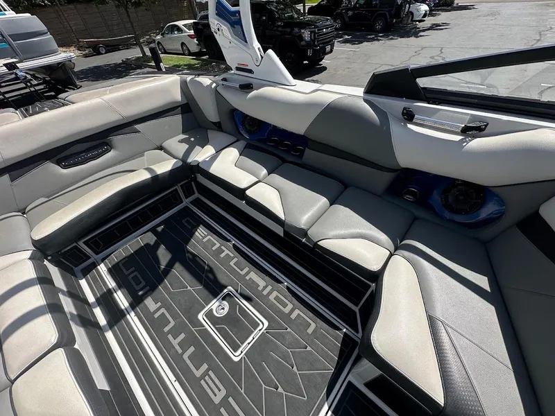 Slide: The Image of 2021 Centurion Fi23 boat interior with spacious seating and modern design. - 16