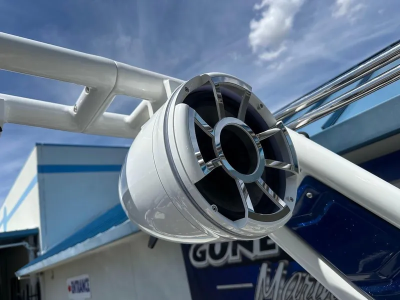 Slide: The Image of Close-up of a 2021 Centurion Fi23 boat speaker against a blue sky background. - 30