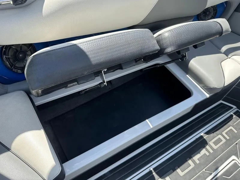 Slide: The Image of Open storage compartment in 2021 Centurion Fi23 boat interior. - 36