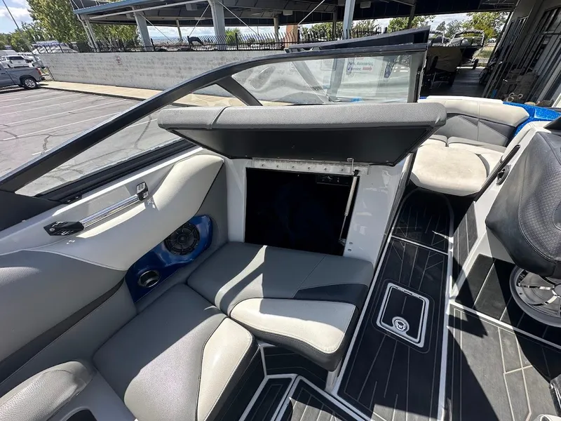 Slide: The Image of 2021 Centurion Fi23 boat interior with gray seating and modern design. - 37