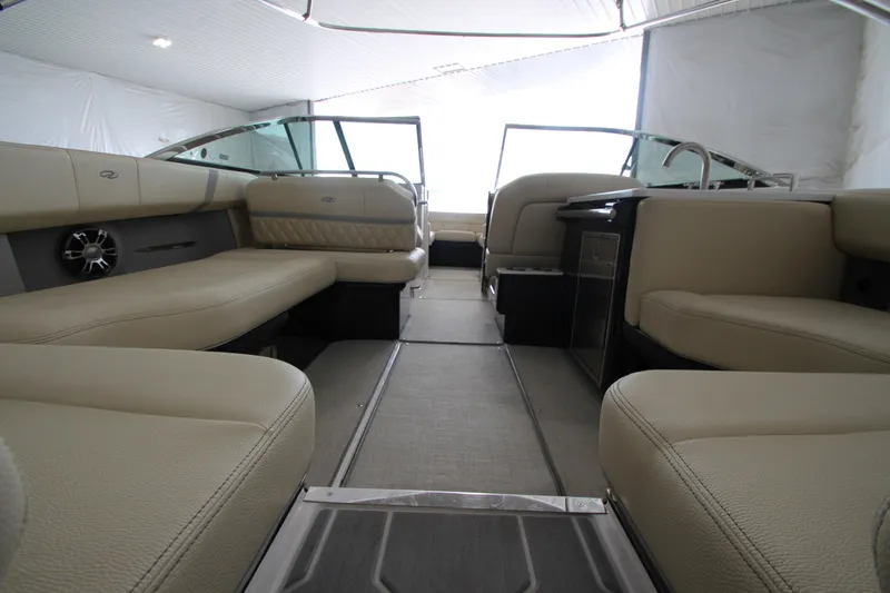 Slide: The Image of 2021 Regal 2800 Bowrider interior with beige seating and modern design. - 13