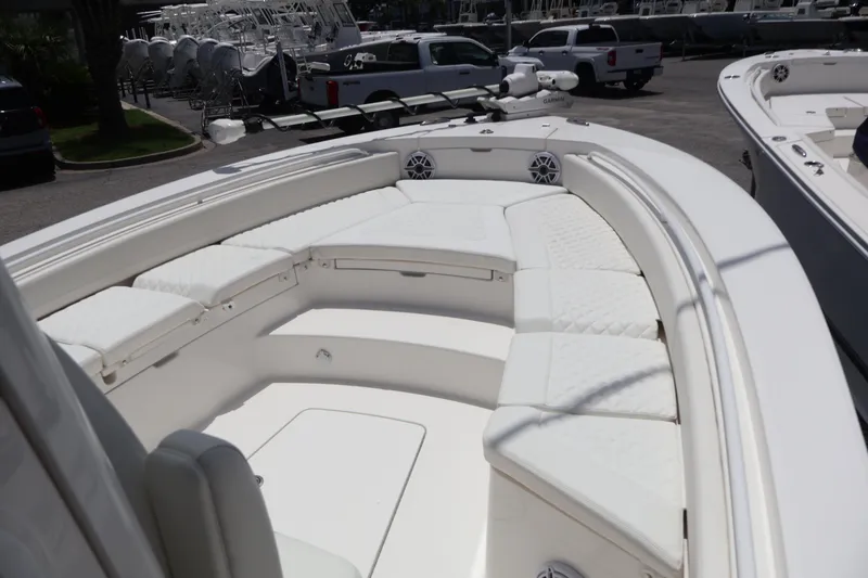 Slide: The Image of 2025 Regulator 26XO boat with spacious white seating and modern design. - 3