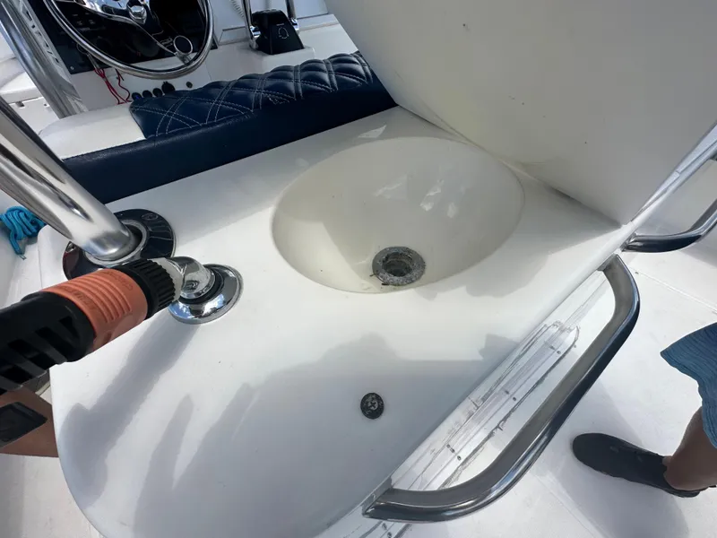 Slide: The Image of Close-up of the sink area on a 2000 Stamas 290 Tarpon boat. - 13