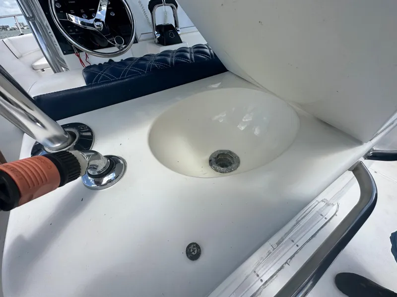 Slide: The Image of Stamas 290 Tarpon 2000 boat sink and faucet in cockpit area. - 14