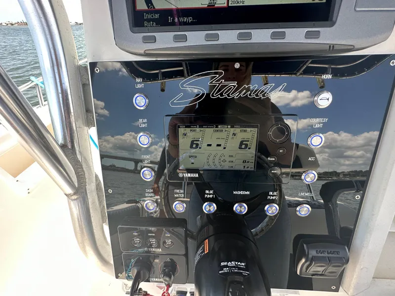 Slide: The Image of Control panel of a 2000 Stamas 290 Tarpon boat with Yamaha display. - 20
