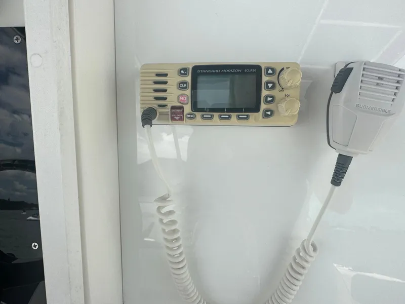 Slide: The Image of VHF radio on a 2000 Stamas 290 Tarpon boat. - 23