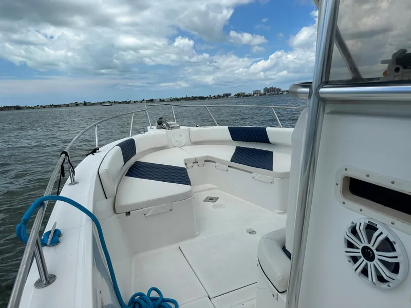 Slide: The Image of 2000 Stamas 290 Tarpon boat with spacious seating on open water. - 27