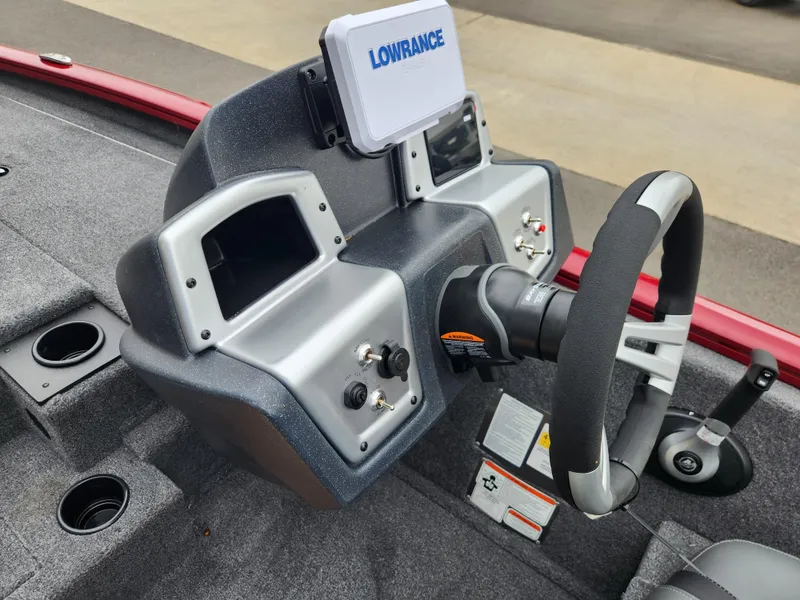 Slide: The Image of Steering console of 2026 Tracker Pro Team 195 boat with Lowrance electronics. - 13