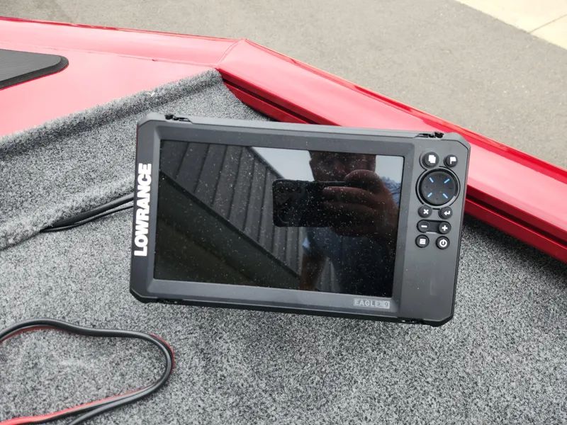 Slide: The Image of Lowrance Eagle 9 fishfinder on 2026 Tracker Pro Team 195 boat deck. - 9
