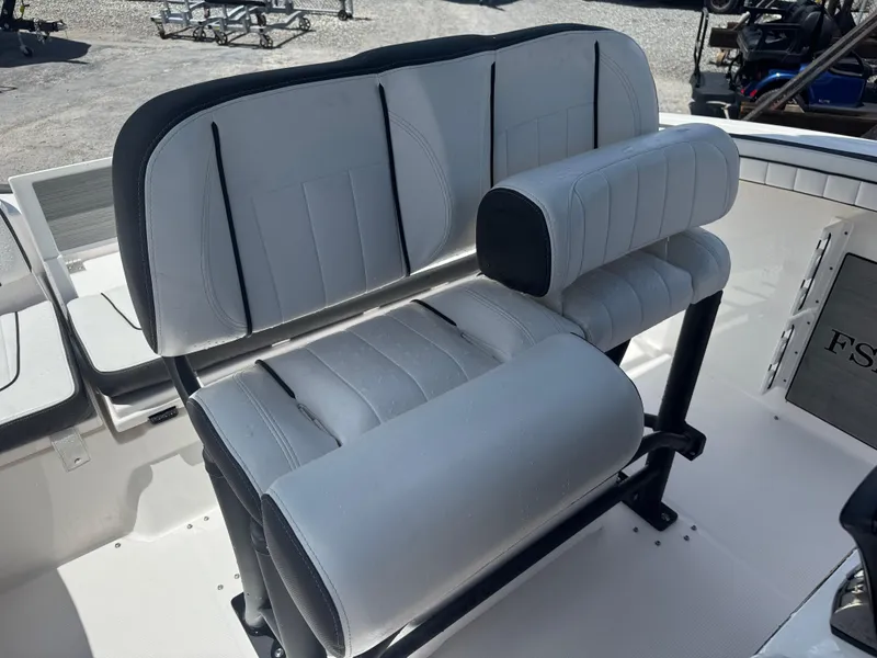 Slide: The Image of 2024 Yamaha Boats 255 FSH Sport E seating, featuring sleek, modern design and comfortable upholstery. - 21