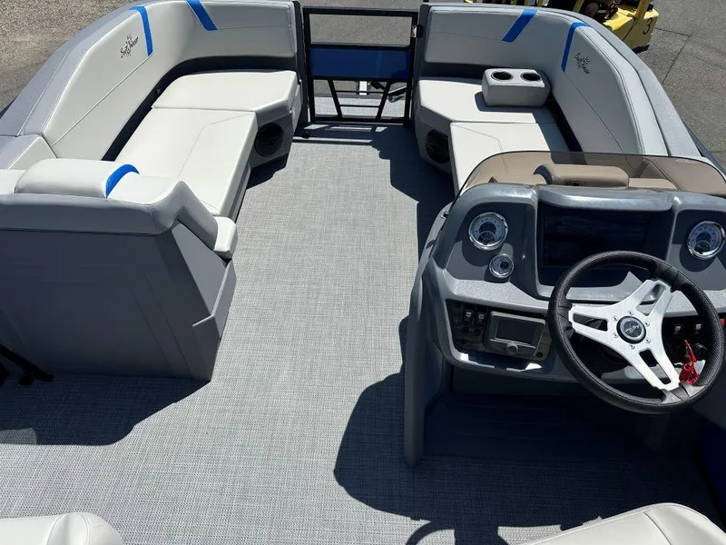 Slide: The Image of 2026 SunChaser Lucerne 20 LR DH pontoon boat interior with seating and steering console. - 5