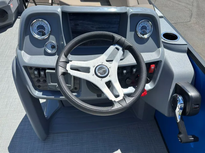 Slide: The Image of Steering console of 2026 SunChaser Lucerne 20 LR DH boat with gauges and controls. - 6