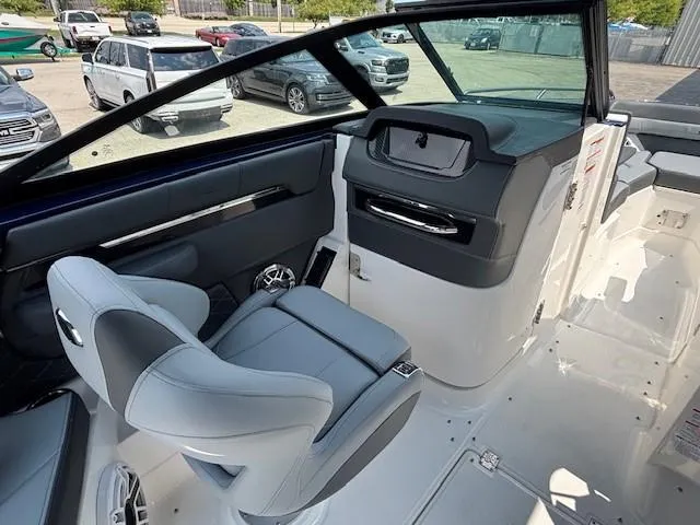 Slide: The Image of 2026 Chaparral SSX 6 boat interior with modern seating and dashboard design. - 25