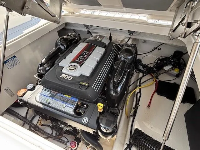 Slide: The Image of Engine compartment of 2026 Chaparral SSX 6 boat, featuring a 6.2L 300 horsepower engine. - 34