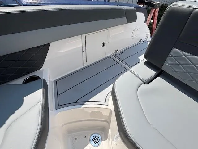 Slide: The Image of 2026 Chaparral SSX 6 boat interior with sleek seating and modern design. - 35