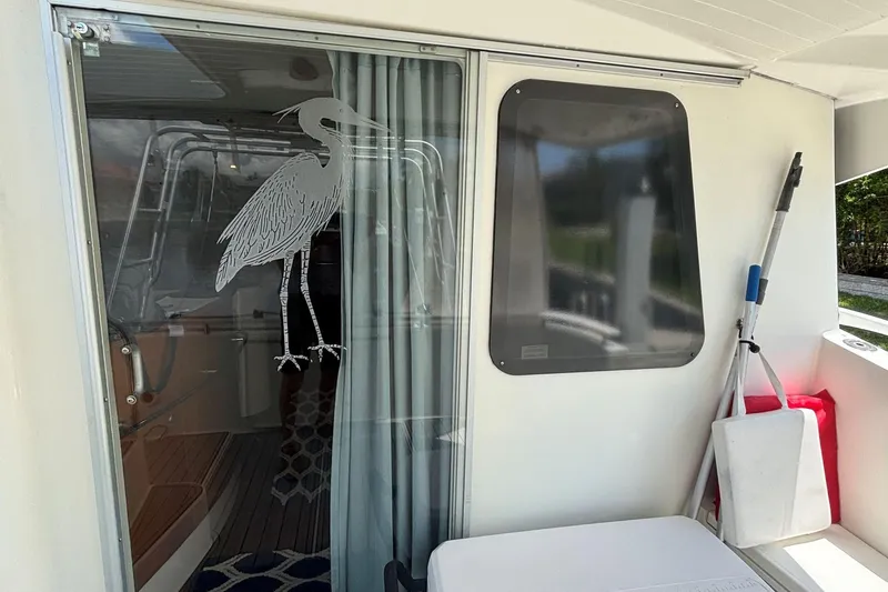 Slide: The Image of Fountaine Pajot Maryland 37 yacht interior with heron decal on glass door, 2000 model. - 16