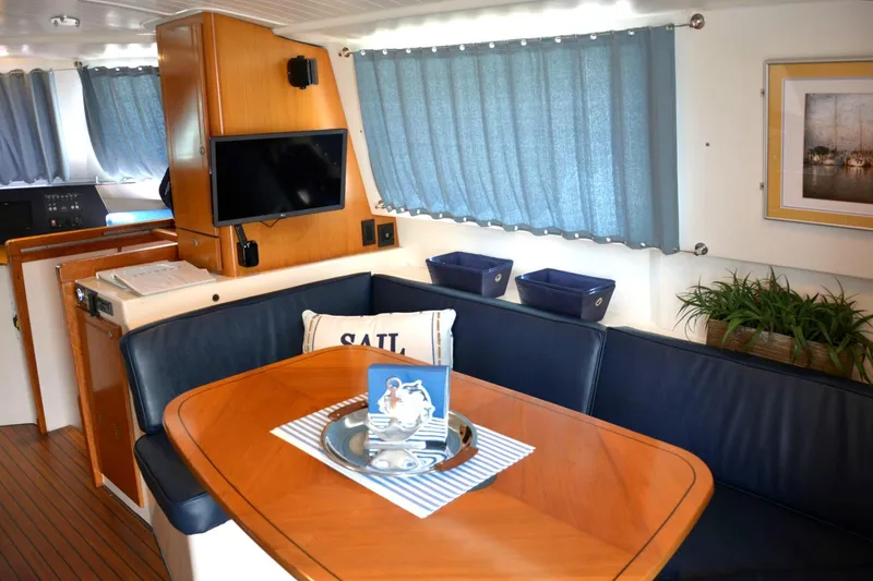 Slide: The Image of Interior of 2000 Fountaine Pajot Maryland 37 yacht with dining area and decor. - 34