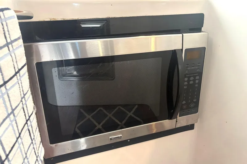 Slide: The Image of Built-in microwave on 2000 Fountaine Pajot Maryland 37 yacht, with stainless steel finish. - 44