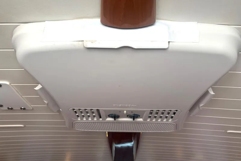 Slide: The Image of Ceiling air conditioning unit in a 2000 Fountaine Pajot Maryland 37 boat interior. - 49