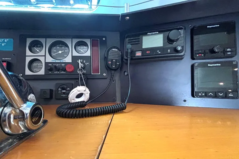 Slide: The Image of Control panel of a 2000 Fountaine Pajot Maryland 37 with navigation instruments. - 54