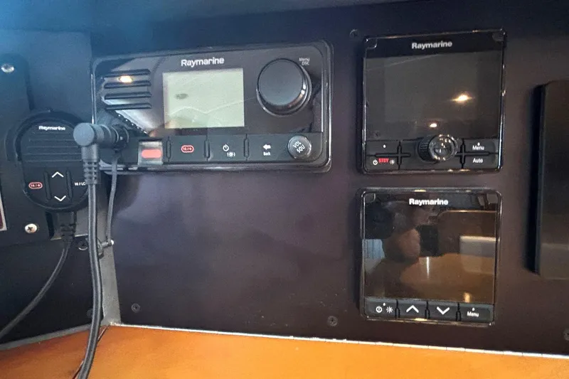 Slide: The Image of Raymarine navigation equipment on 2000 Fountaine Pajot Maryland 37 yacht dashboard. - 56