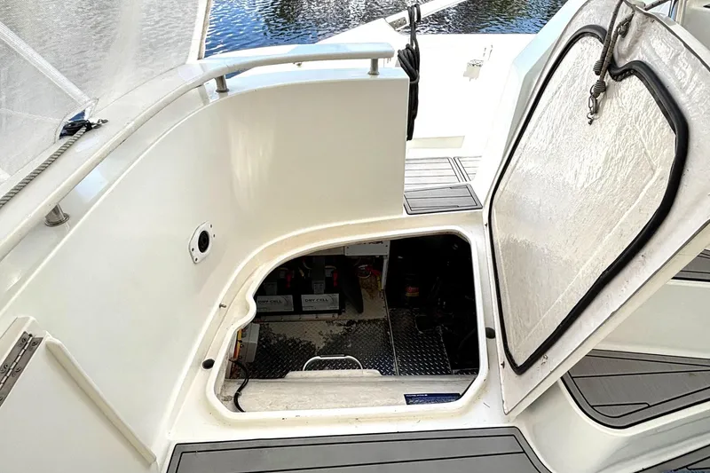 Slide: The Image of Open hatch on 2000 Fountaine Pajot Maryland 37, revealing engine compartment. - 69