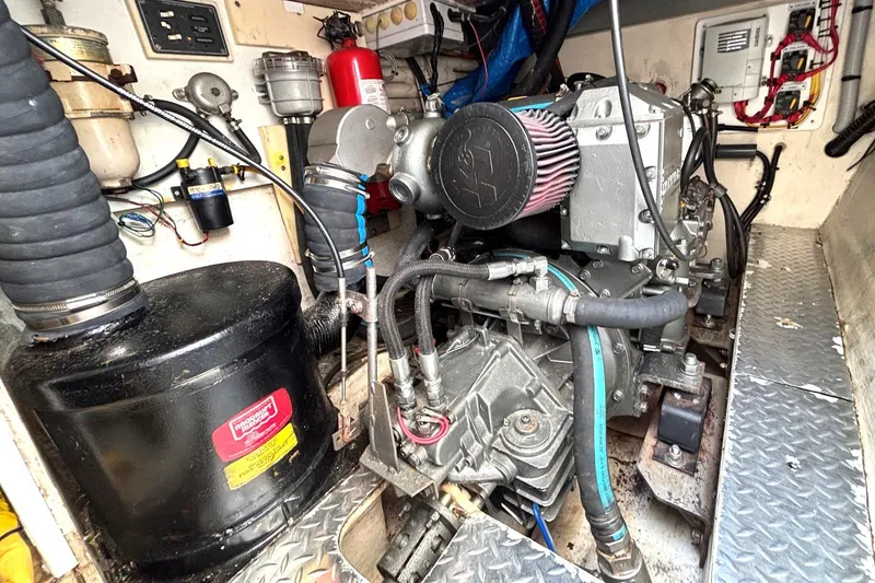 Slide: The Image of Engine room of 2000 Fountaine Pajot Maryland 37 with visible components and wiring. - 71