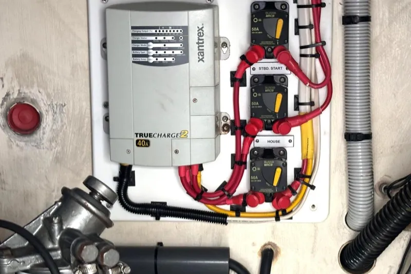 Slide: The Image of Electrical panel with Xantrex TrueCharge2 charger on 2000 Fountaine Pajot Maryland 37 boat. - 72
