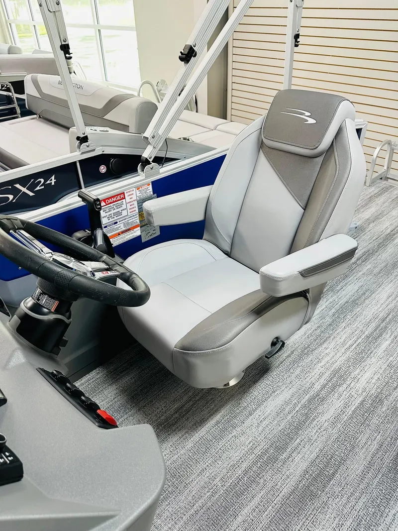 Slide: The Image of Captain's chair in a 2025 Bennington 21 SL boat, featuring sleek design and comfortable seating. - 3