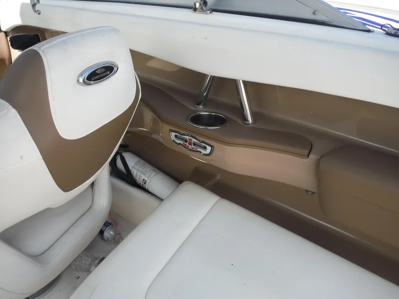 Slide: The Image of Interior of 2015 Chaparral 226 SSi boat with seating and cup holder. - 28