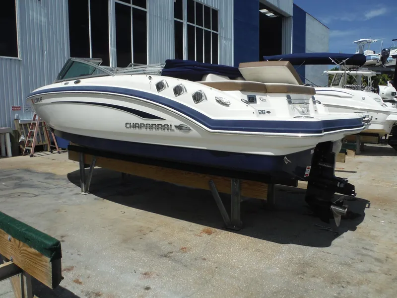 Slide: The Image of 2015 Chaparral 226 SSi boat on display outside a marine facility. - 31