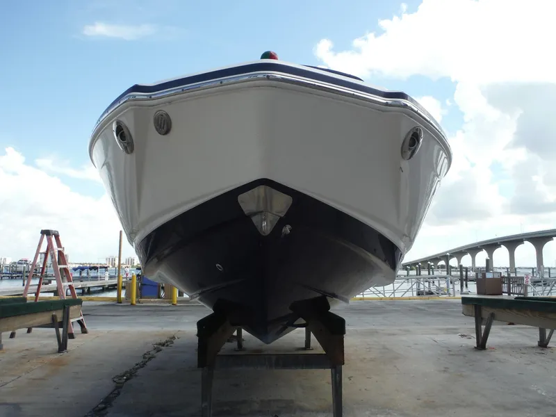 Slide: The Image of 2015 Chaparral 226 SSi boat on dry dock, marina background. - 4