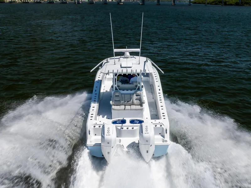 Slide: The Image of 2024 Freeman 35 boat cruising swiftly on open water. - 20