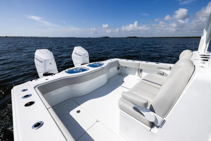 Slide: The Image of 2024 Freeman 35 boat with dual Mercury engines on open water. - 28