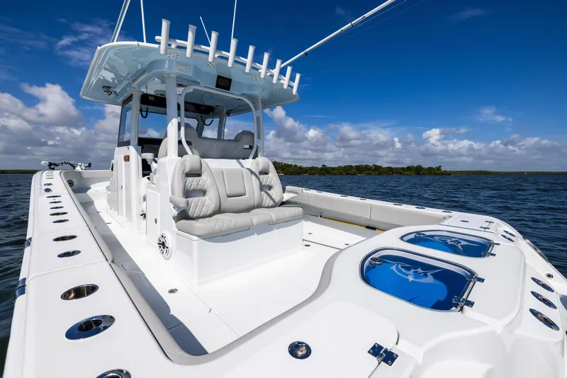 Slide: The Image of 2024 Freeman 35 boat on water, featuring sleek design and luxurious seating. - 36