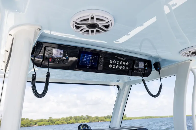 Slide: The Image of 2024 Freeman 35 boat dashboard with modern navigation and communication equipment. - 43