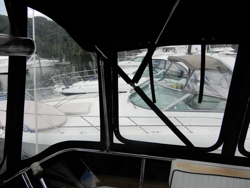 Slide: The Image of 1987 Carver 28 Mariner/Voyager docked at marina, view from cabin window. - 18