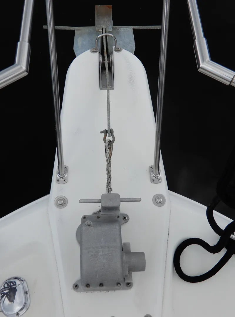 Slide: The Image of Bow of 1987 Carver 28 Mariner Voyager with anchor winch and railing. - 11