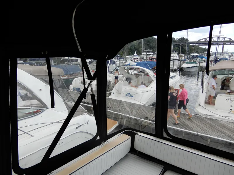 Slide: The Image of 1987 Carver 28 Mariner/Voyager at marina, view from cabin, boats docked nearby. - 19