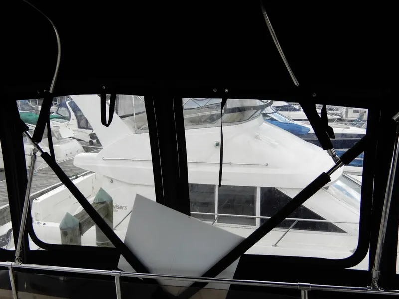 Slide: The Image of 1987 Carver 28 Mariner/Voyager yacht view from interior, docked at marina. - 21