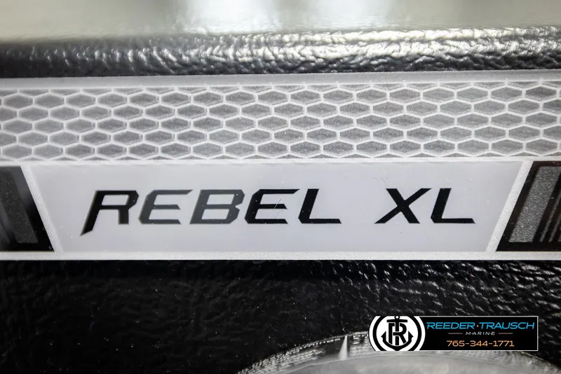 Slide: The Image of 2026 Lund 1650 Rebel XL SS boat logo with hexagonal pattern background. - 27