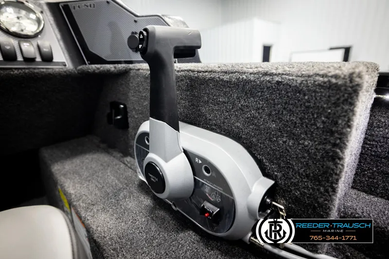 Slide: The Image of Throttle control of 2026 Lund 1650 Rebel XL SS boat, featuring sleek design and modern controls. - 30