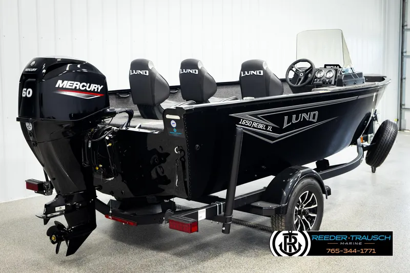 Slide: The Image of 2026 Lund 1650 Rebel XL SS boat with Mercury 60 engine on trailer. - 4