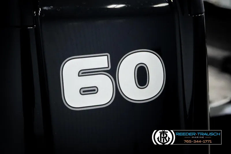 Slide: The Image of Close-up of '60' on 2026 Lund 1650 Rebel XL SS boat engine. - 41