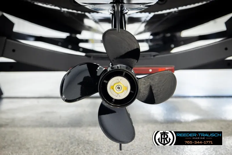 Slide: The Image of Close-up of a 2026 Lund 1650 Rebel XL SS boat propeller, displayed at Reeder-Trausch Marine. - 42