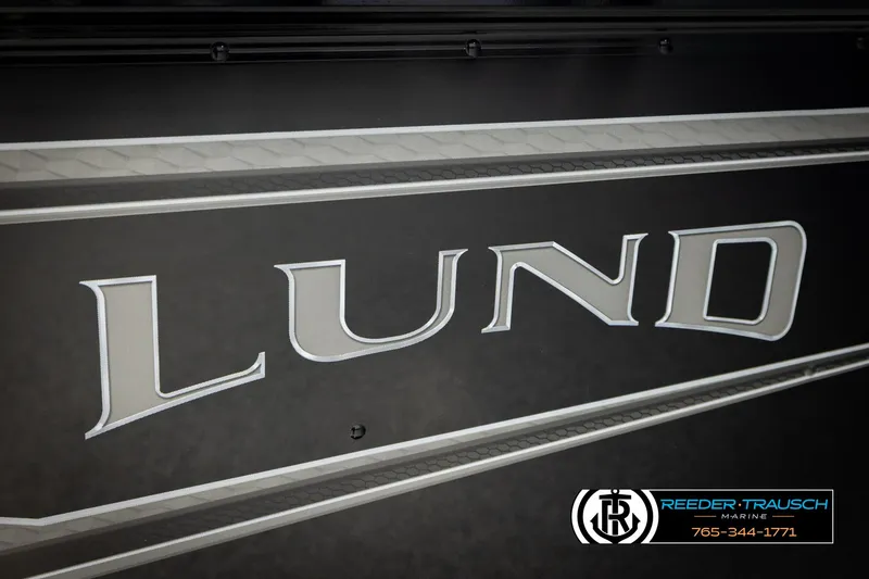 Slide: The Image of 2026 Lund 1650 Rebel XL SS boat logo with Reeder-Trausch Marine branding. - 45