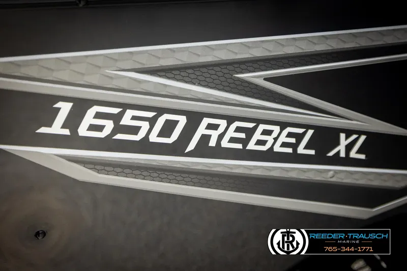 Slide: The Image of 2026 Lund 1650 Rebel XL SS boat logo with Reeder-Trausch Marine contact details. - 46