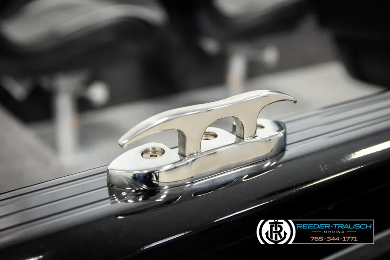 Slide: The Image of Chrome cleat on 2026 Lund 1650 Rebel XL SS boat, close-up view. - 48
