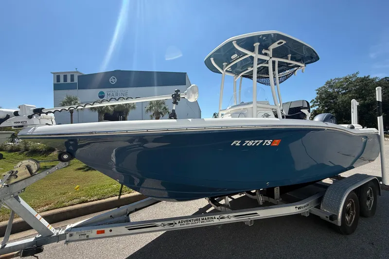 Slide: The Image of 2023 Tidewater 210 LXF boat on trailer at Emerald Coast Marine. - 15